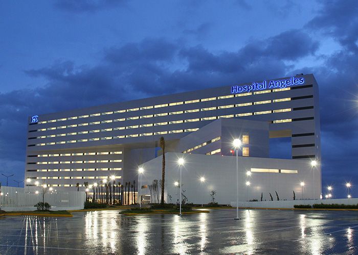 Hospital Ángeles Puebla building at dusk